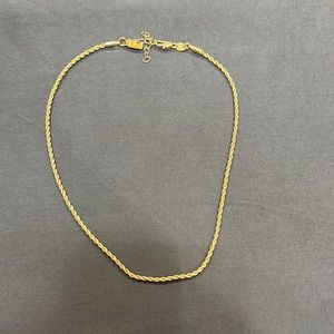 Electric picks necklace.  Company has no tarnish  guarantee